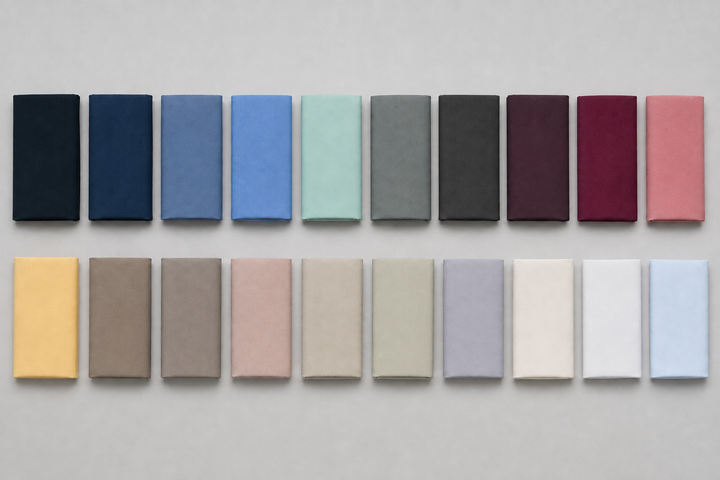 AI-restaged source composition of twenty cotton twill fabric cuts in two rows.