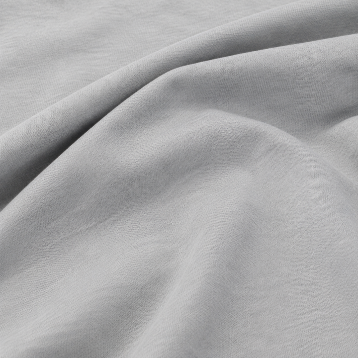 Double French Terry fabric, pale gray, smooth knit studio view 1