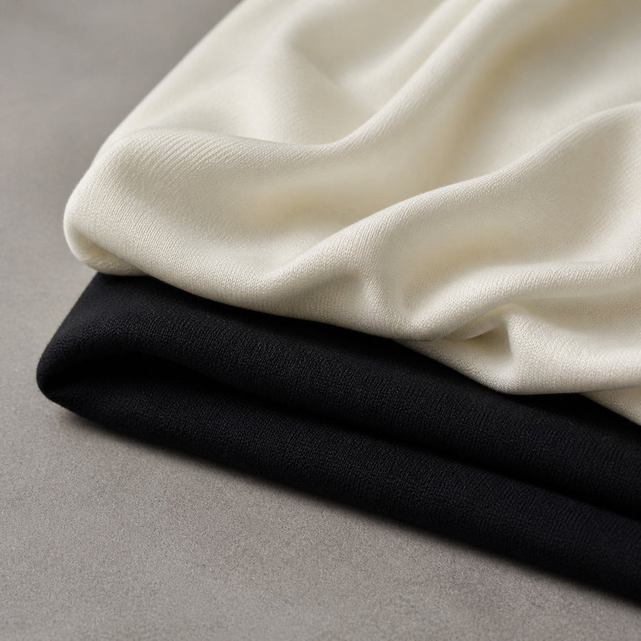 RANGE COVER | Wool Jersey Knit | Cream and Black | AI fabric photograph