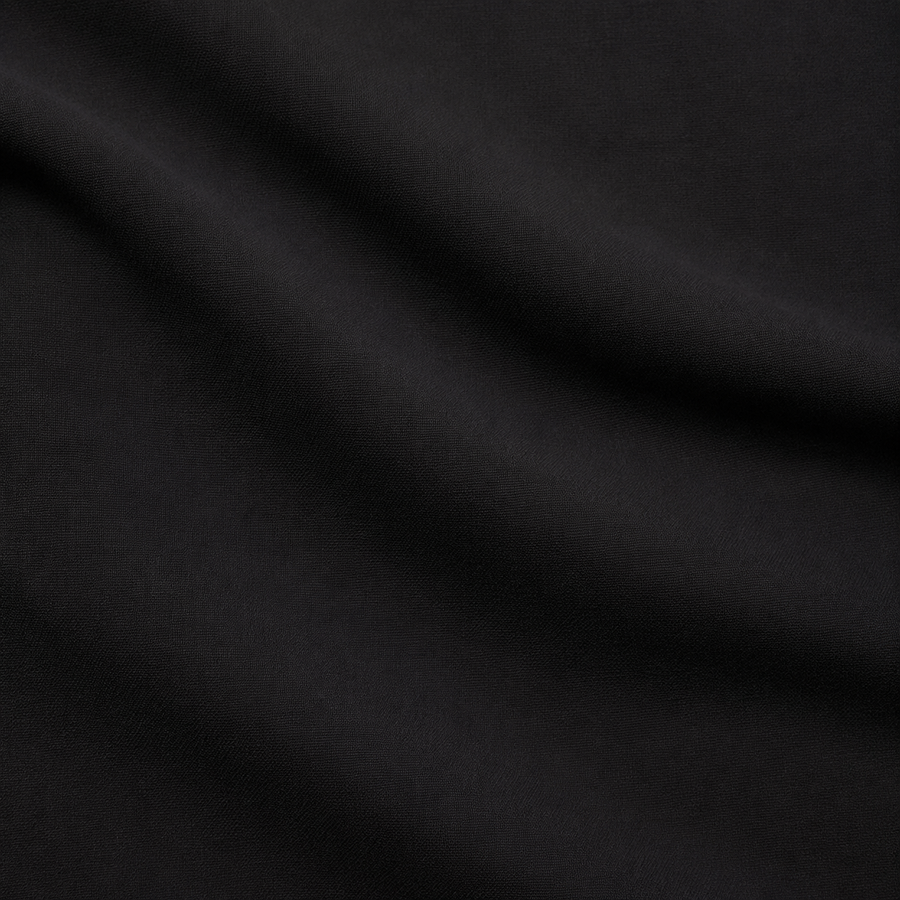 VARIANT_ID: 48518170738900 | Black DTY Brush Fabric by the Yard | AI restaged gallery view 1