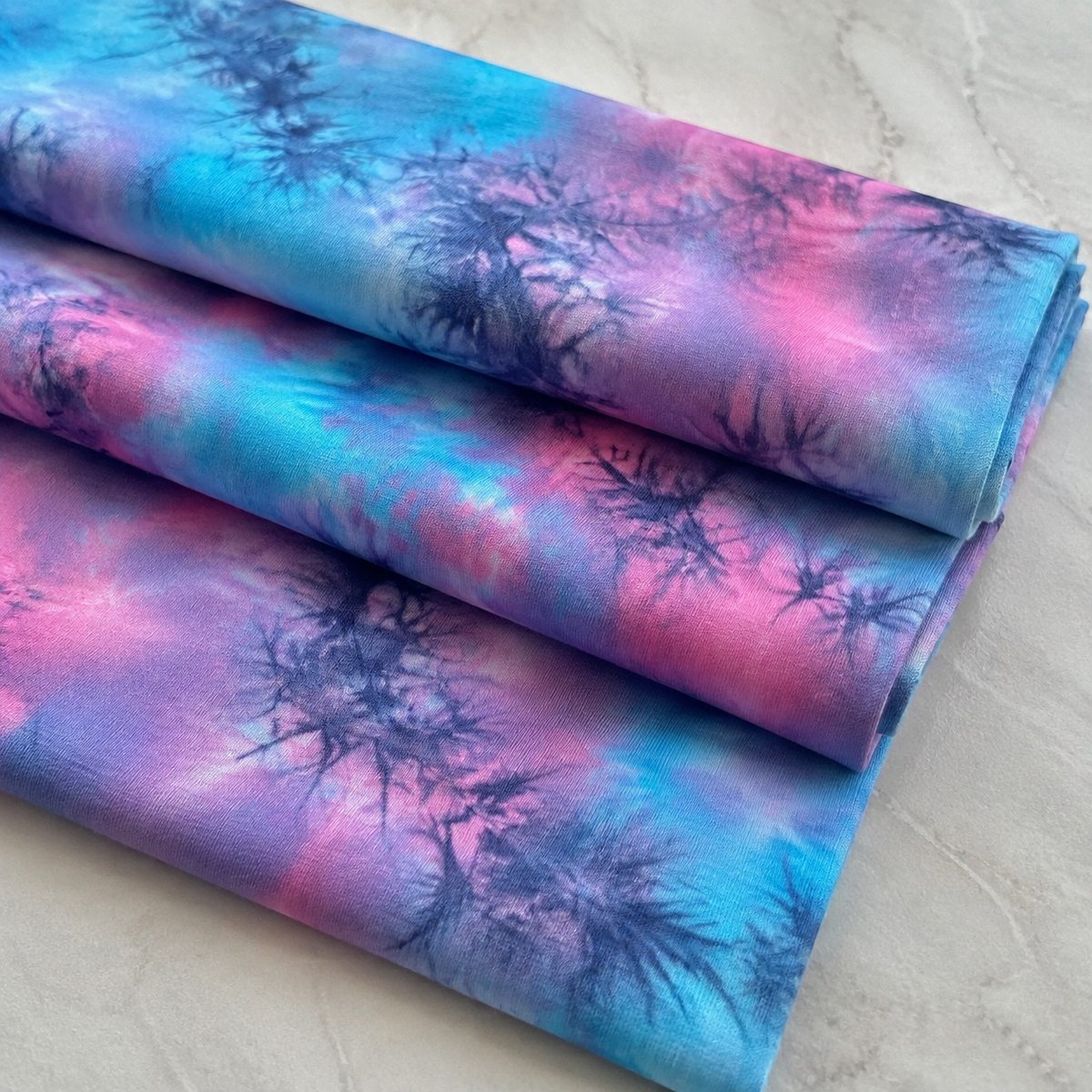 VARIANT_ID: 48621212401876 | Bamboo Jersey Knit Tie-dye By the Yard | AI product view 1