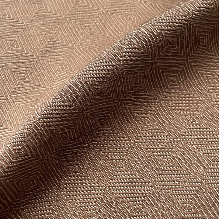 Brown and cream woven diamond jacquard in a shallow fold, AI-restaged from the source fabric.